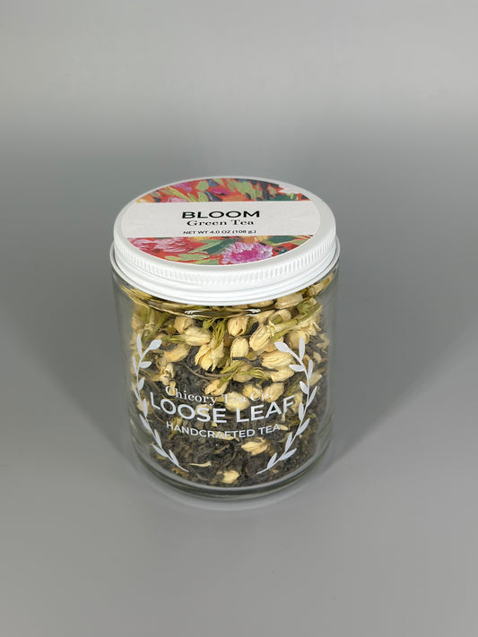 Chicory Tea Co.'s Bloom Green Tea in the jar, view from front