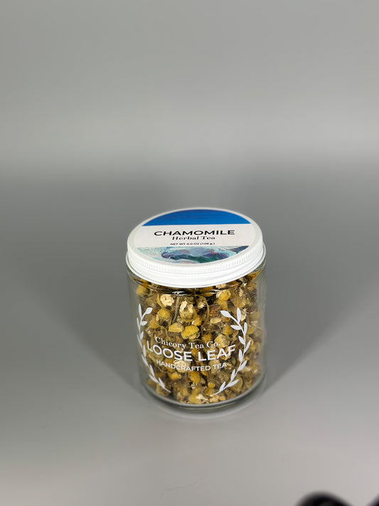 Chicory Tea Co.'s Chamomile Herbal Tea in the jar, view from front