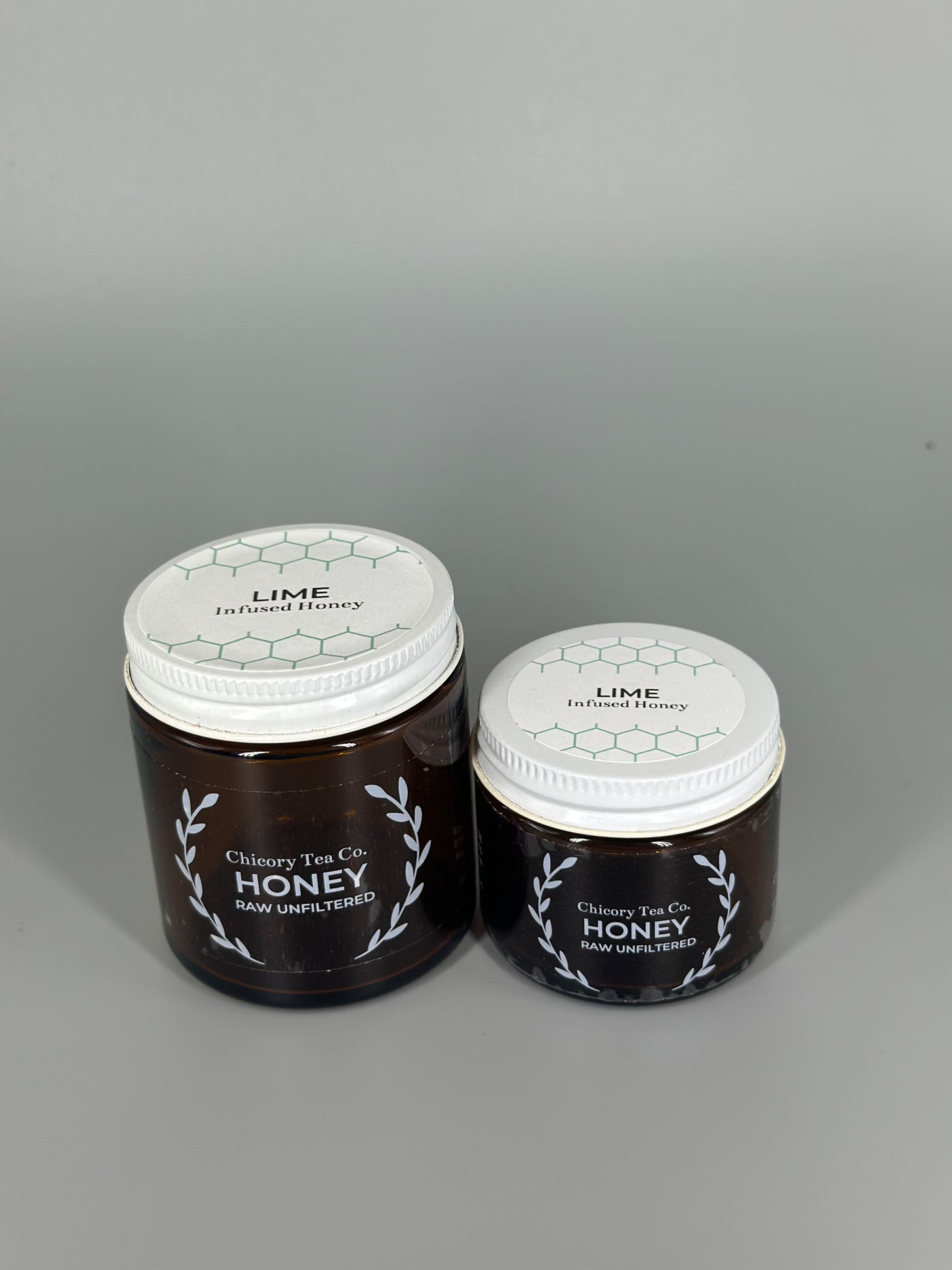 Chicory Tea Co.'s Lime Honey 2oz and 4oz in jars, view from front
