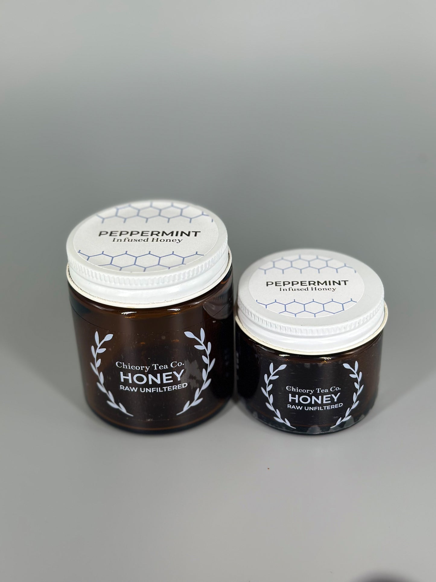 Chicory Tea Co.'s Peppermint Honey 2oz and 4 oz in the jar, view from front