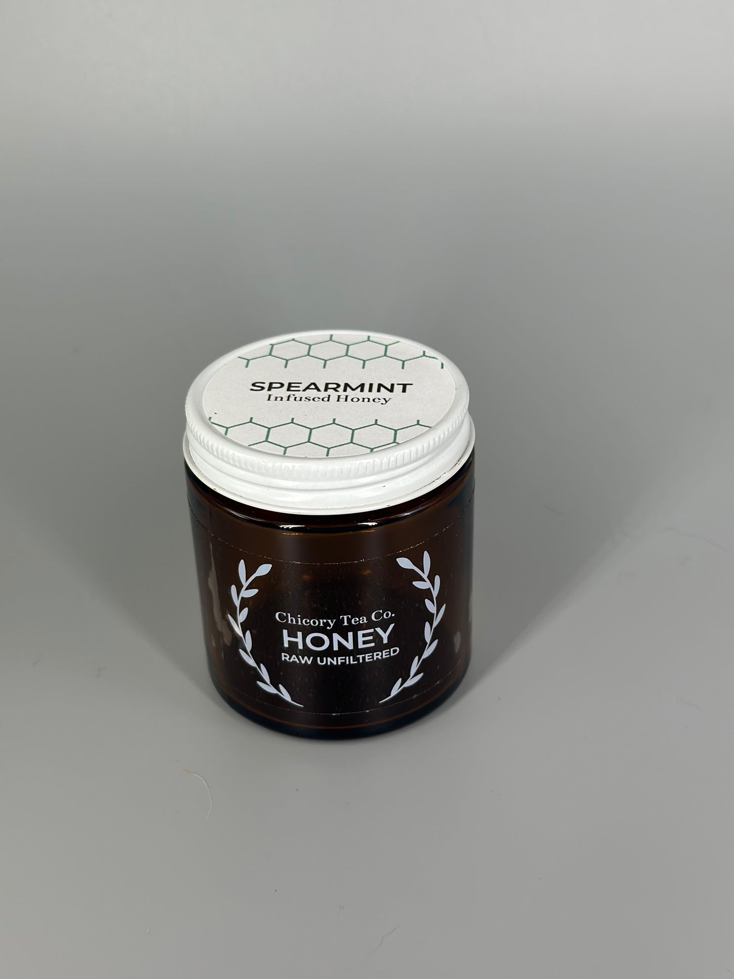 Chicory Tea Co.'s Spearmint Honey in the jar, view from front