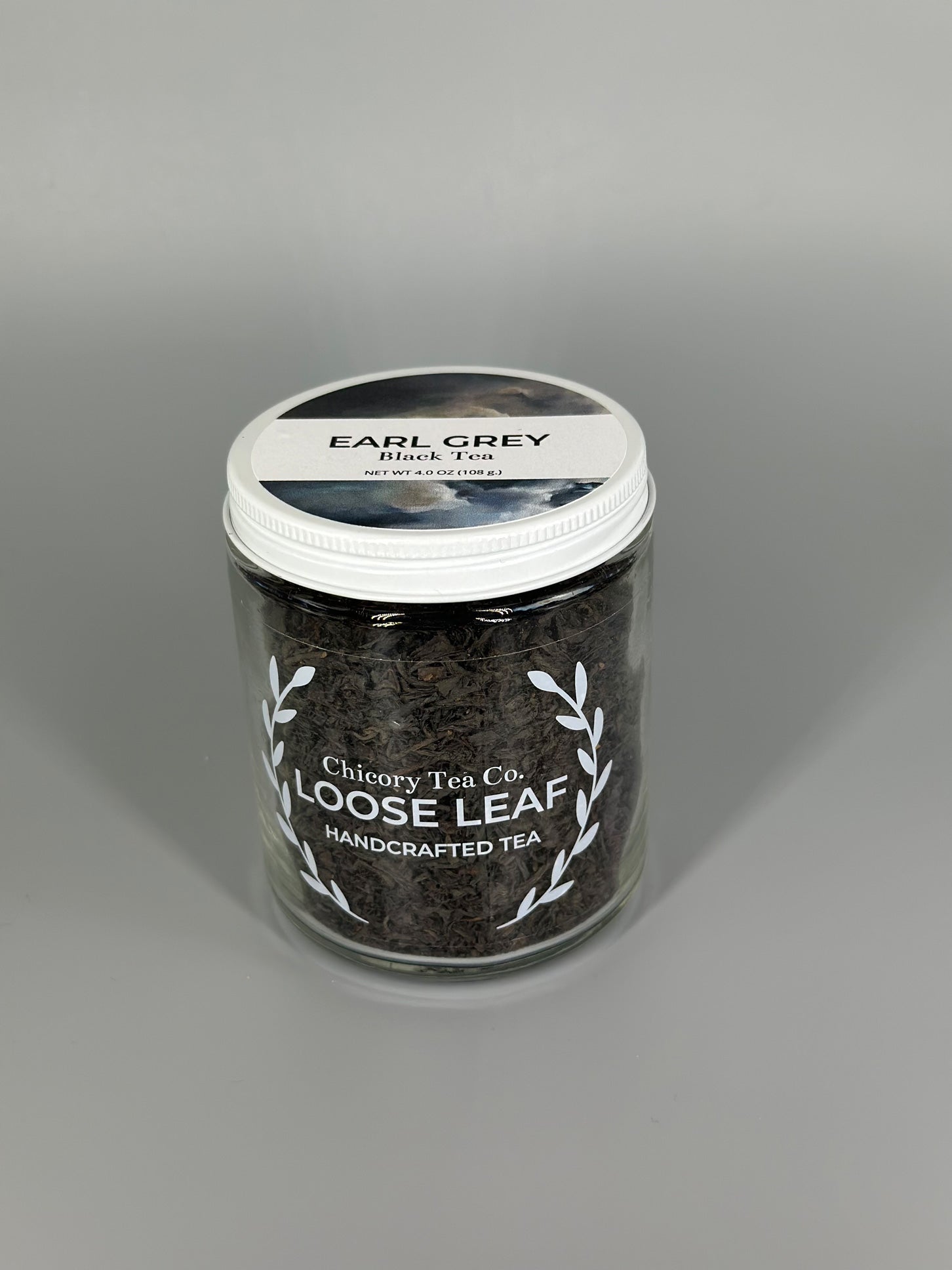 Chicory Tea Co.'s Earl Grey Black Tea in the jar, view from front