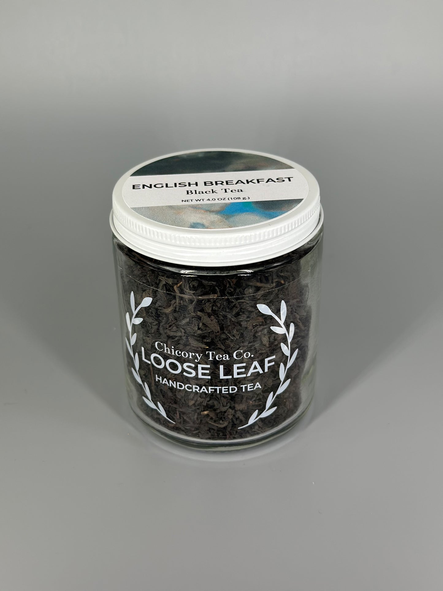 Chicory Tea Co.'s English Breakfast Black Tea in the jar, view from the front