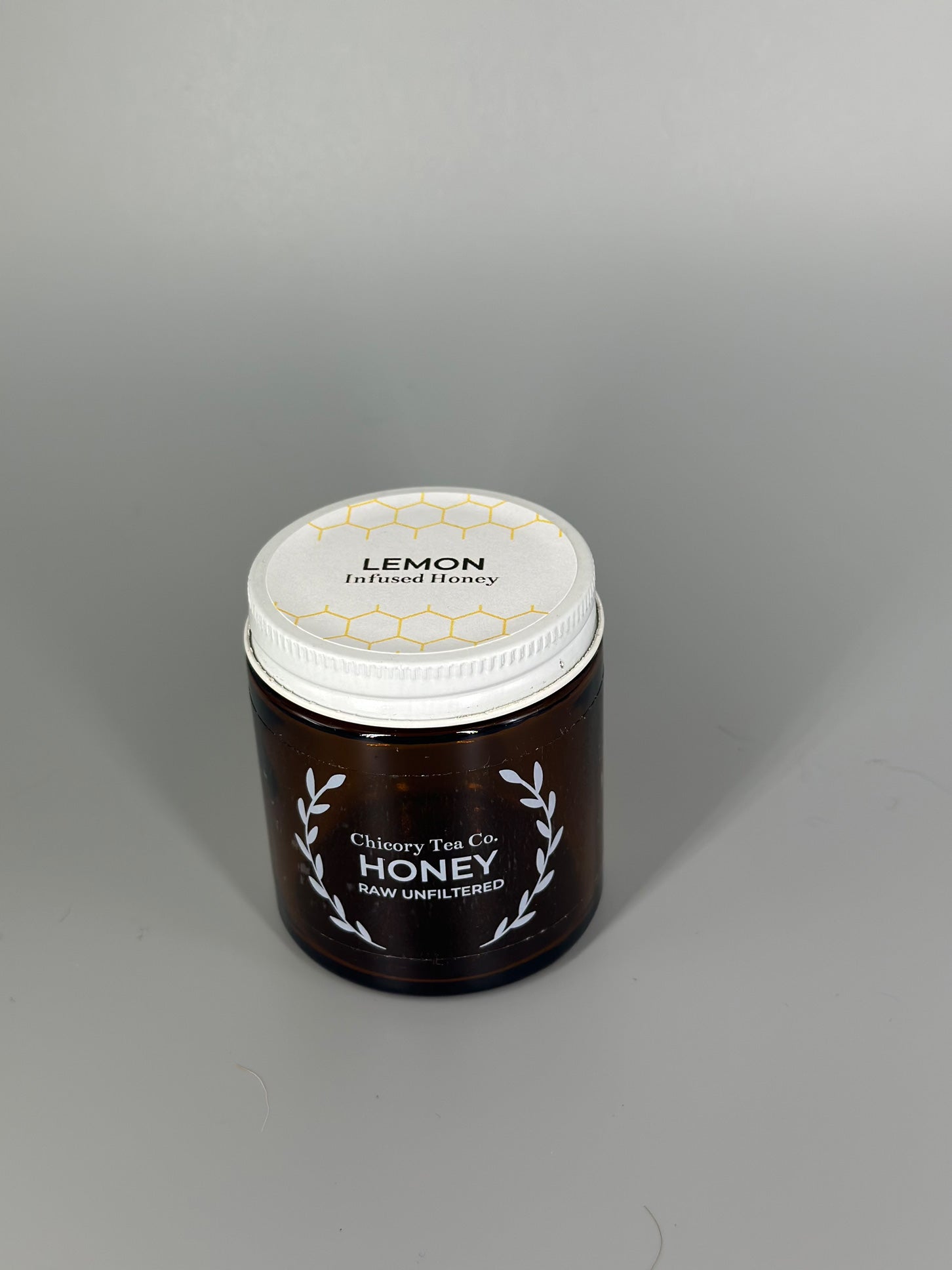 Chicory Tea Co.'s Lemon Honey in the jar, from the front